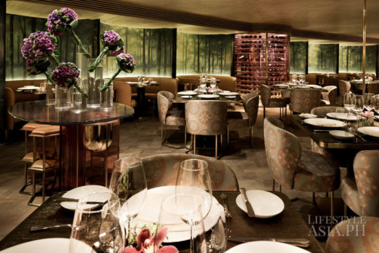 The main dining room is inspired by France's lush forestry