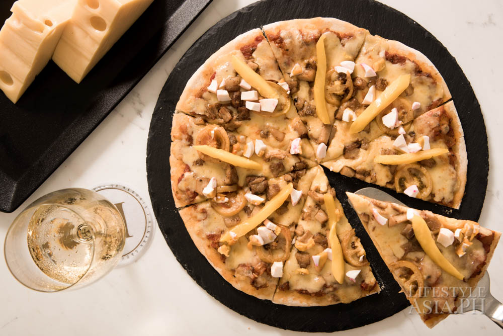 The Adobo Pizza is a Filipino twist on the classic Italian favorite