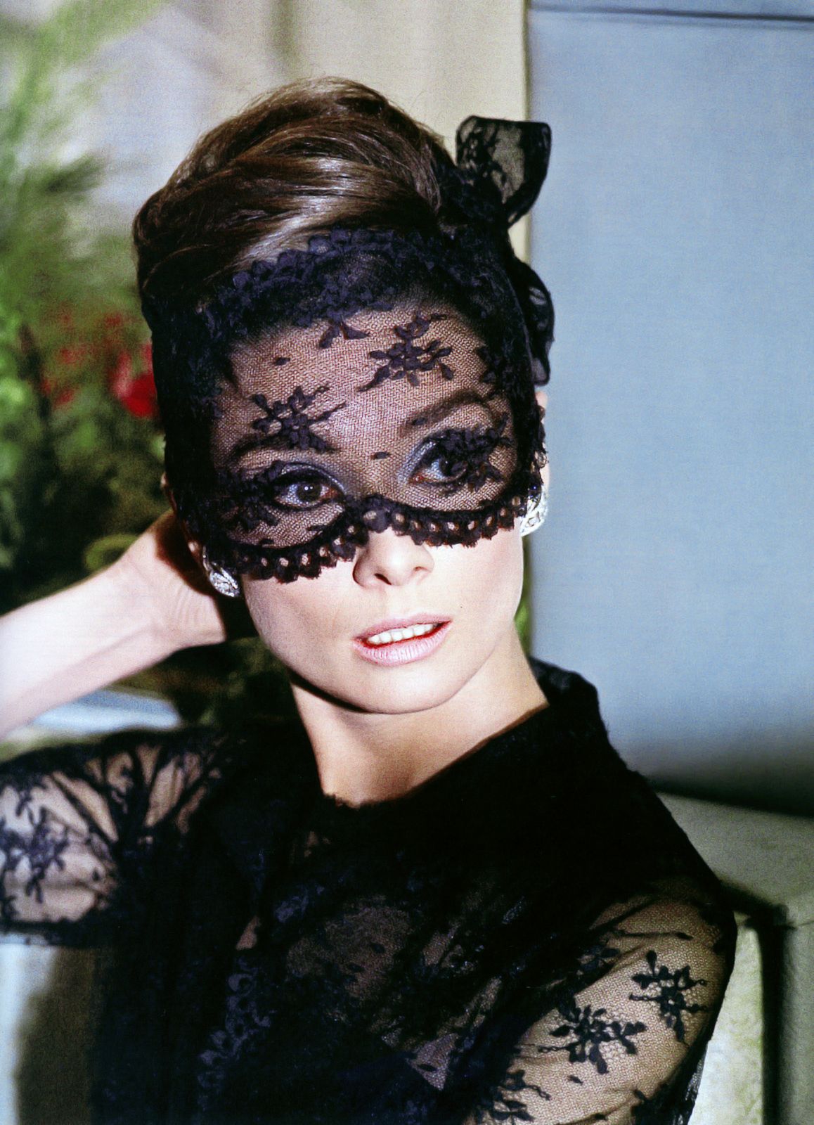 Audrey was in disguise for this scene in How to Steal a Million (1966). Givenchy designed a lace cocktail dress with a matching mask. 