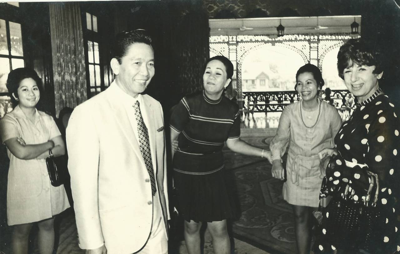 Pat Masigan alongside other Blue Ladies with former president Ferdinand Marcos.