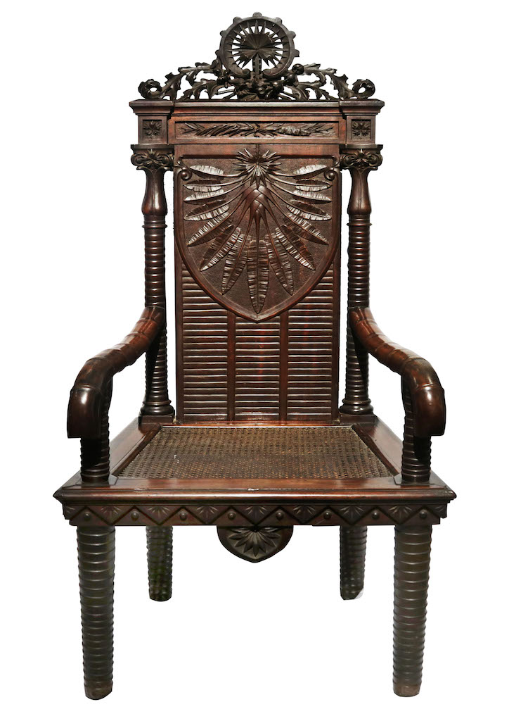Isabelo Tampinco (1850 - 1933) Armchair 1909 Narra and Rattan H: 55” x L: 25 1/2” x W: 21 1/2” (140 cm x 65 cm x 55 cm)