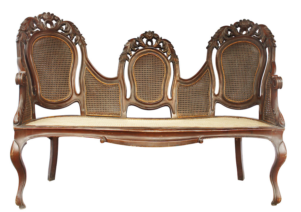 The Ah-Tay Tinio Mariposa 3rd Quarter of the 19th Century Narra and Rattan H: 39 1/2” x L: 75” x W: 26” (100 cm x 191 cm x 66 cm)