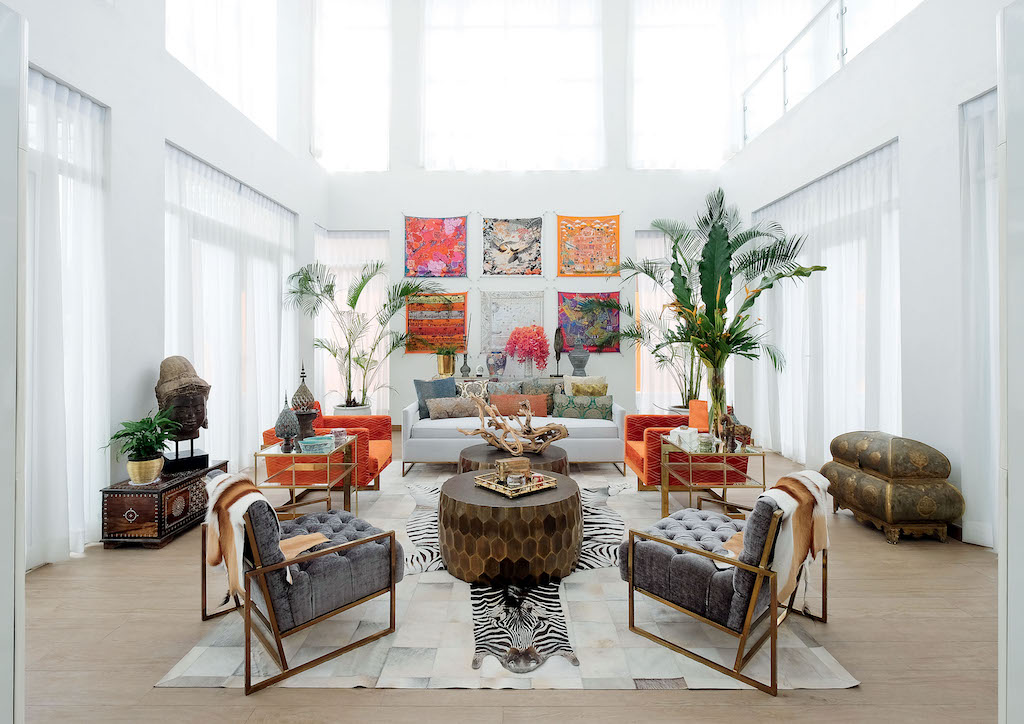 The focal point of Maggie's living room are six bright Hermès scarves she uses as art. This is the location of Lifestyle Asia's current Home & Design cover.