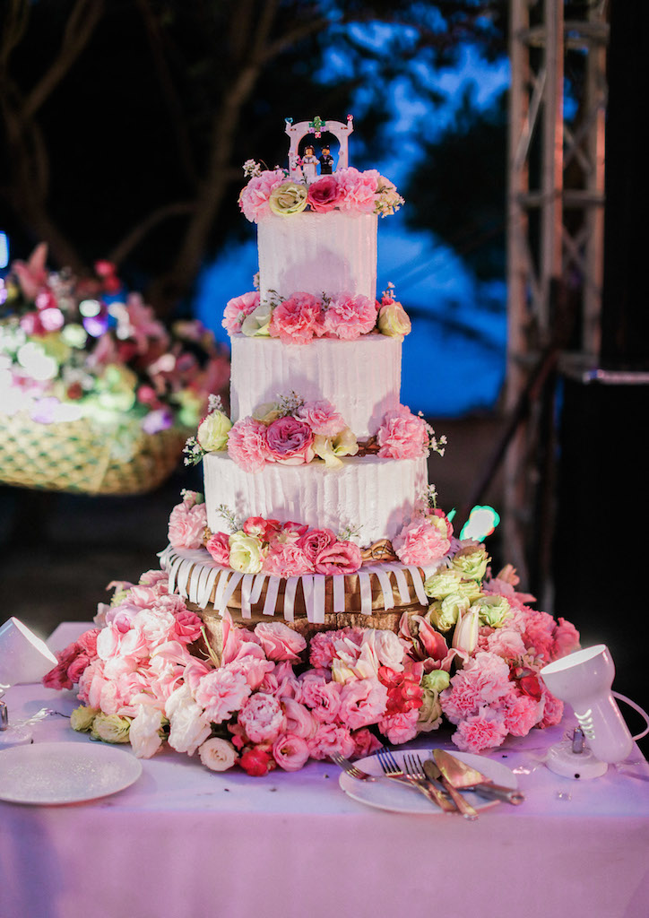 A four-tiered wedding cake from Too Nice to Slice