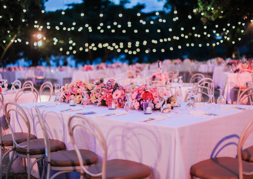Fairy lights and grand blooms for the centerpieces added to the magic of the night