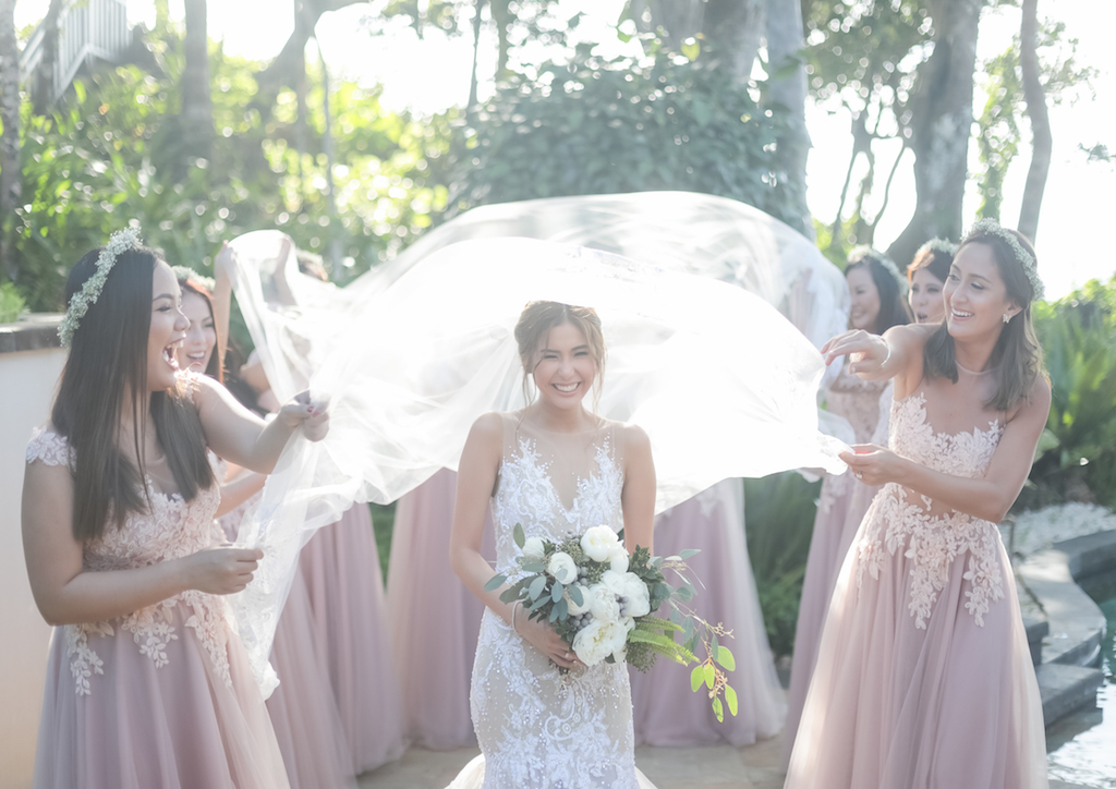The bridesmaids send off the bride to the journey of married life
