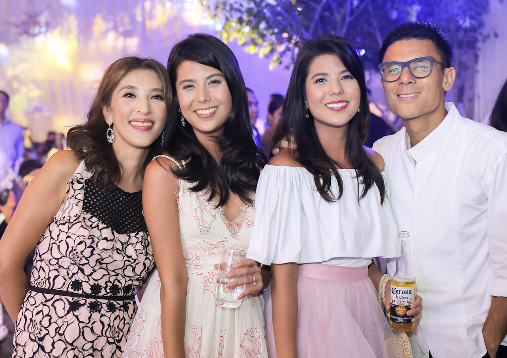 Nicole Tantoco with her twin sister Camille, and her parents Crickette and Donnie (Photography by Jaja Samaniego)