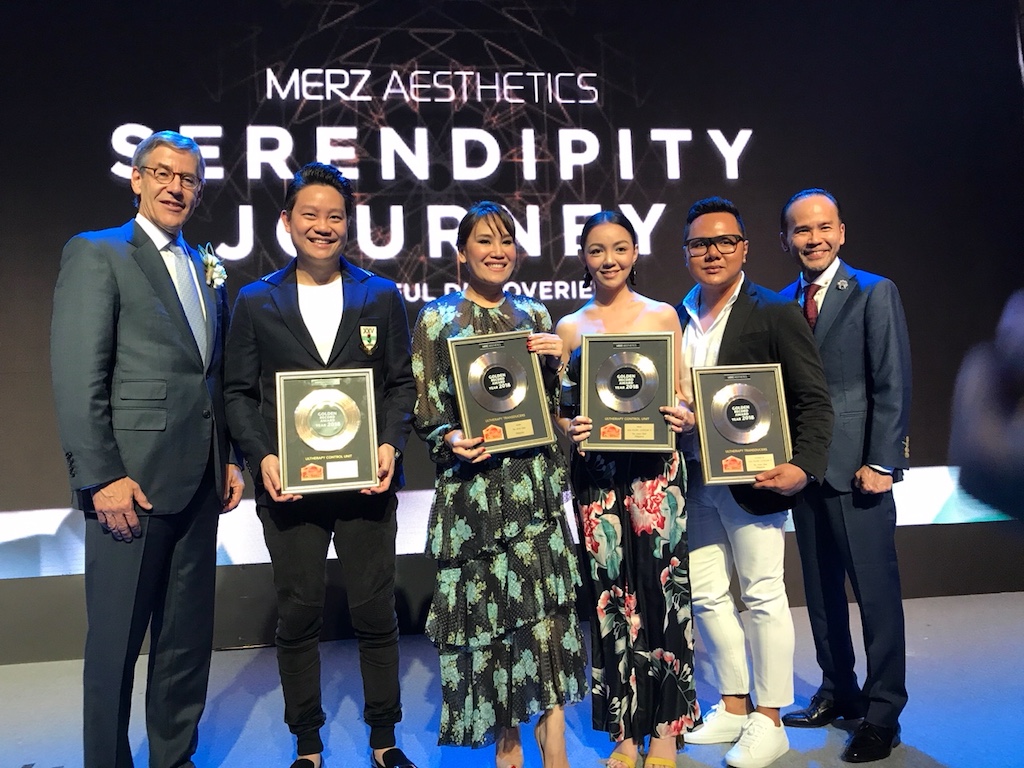 MERZ CEO Philip Burchard with The Aivee Group's Dr. Z Teo, Dr. Aivee Teo, Ann Tirona, and Chris Carreon, Merz APAC CEO Lawrence Siow