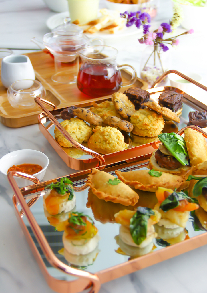 Two platters are served during afternoon tea. One with sweet confections, the other with savory treats