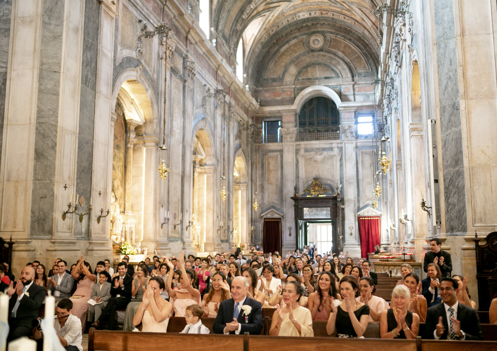 Guests from all over the world watched as Anne Gauthier and Mickael Das Neves wed at the Basilica Da Estela (Photograph by Catarina Zimbarra)
