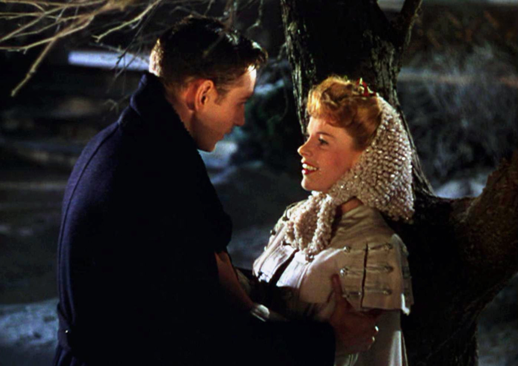 John Truett (Tom Drake) tries to convince Esther (Judy Garland) not to move to New York in Meet Me in St. Louis (1944)