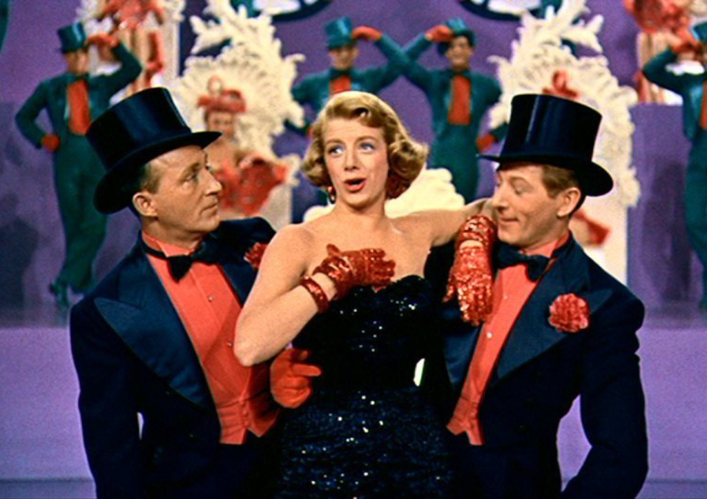 Bing Crosby, Rosemary Clooney and Danny Kaye performing in a musical number in "White Christmas" (1954)