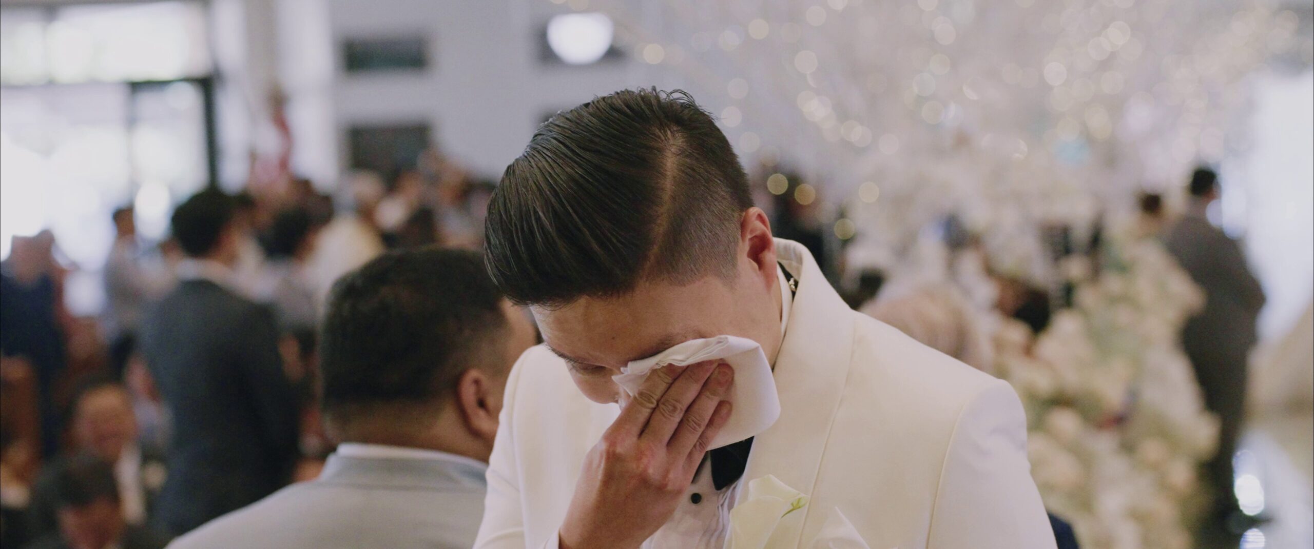 Another still of a teary-eyed Alfred Dichaves during his wedding