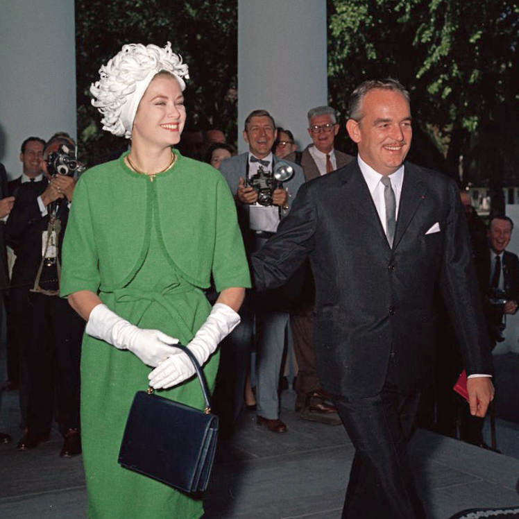 Grace Kelly and her husband, Prince Rainier III, at a White House luncheon in 1961