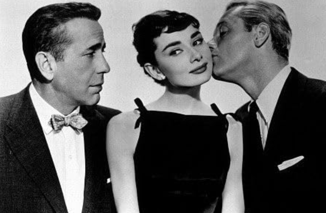 L-R: Humphrey Bogart (Linus Larabee), Audrey Hepburn (Sabrina Fairchild), William Holden (David Larabee)