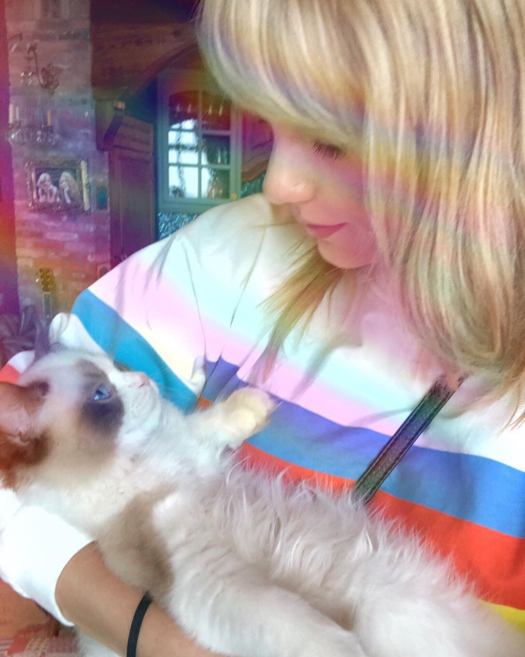 Taylor Swift and her cat, Benjamin