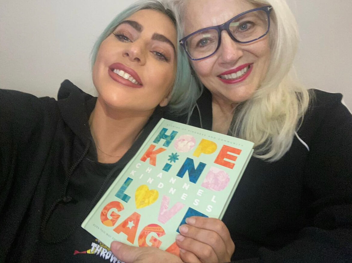 A sweet photo of Lady Gaga with her mother showing off her book.