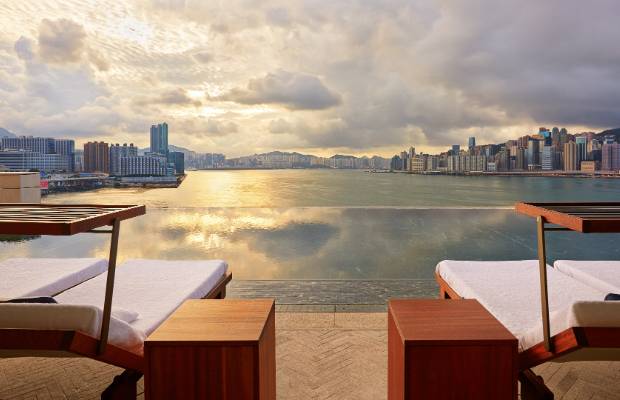 Views of the city's skyline await at the Rosewood Hong Kong