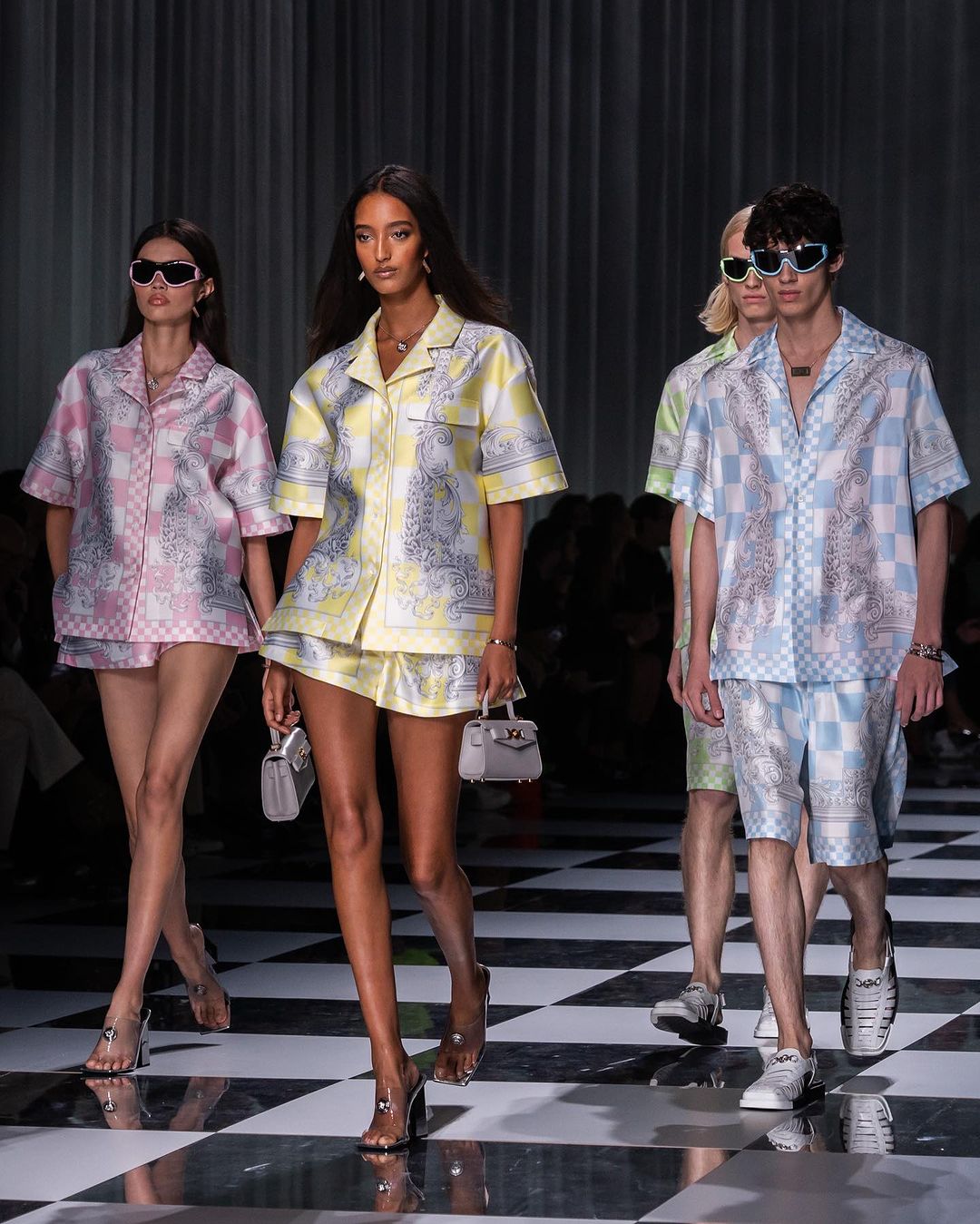 Models showcasing clothing from Versace's Spring/Summer 2024 collection Milan Fashion Week 2023