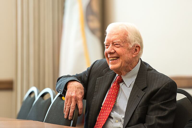 The former president smiling. Photo taken on 24 February 2013.