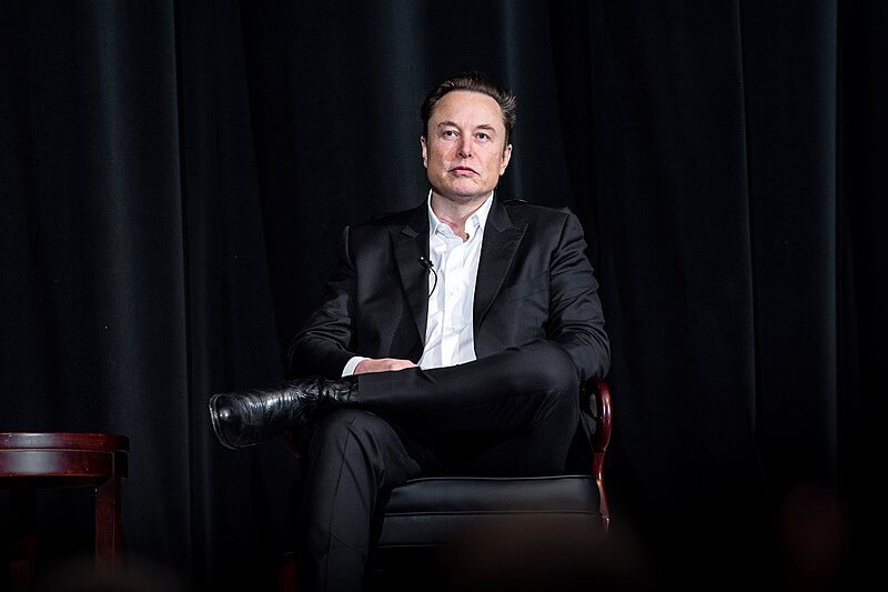 Tesla Inc. Chief Executive Officer Elon Musk speaks with Lt. Gen. Richard Clark, Superintendent of the U.S. Air Force Academy, during the Ira C. Eaker Distinguished Speaker Presentation in the Academy's Arnold Hall on April 7, 2022 in Colorado Springs, Colo.
