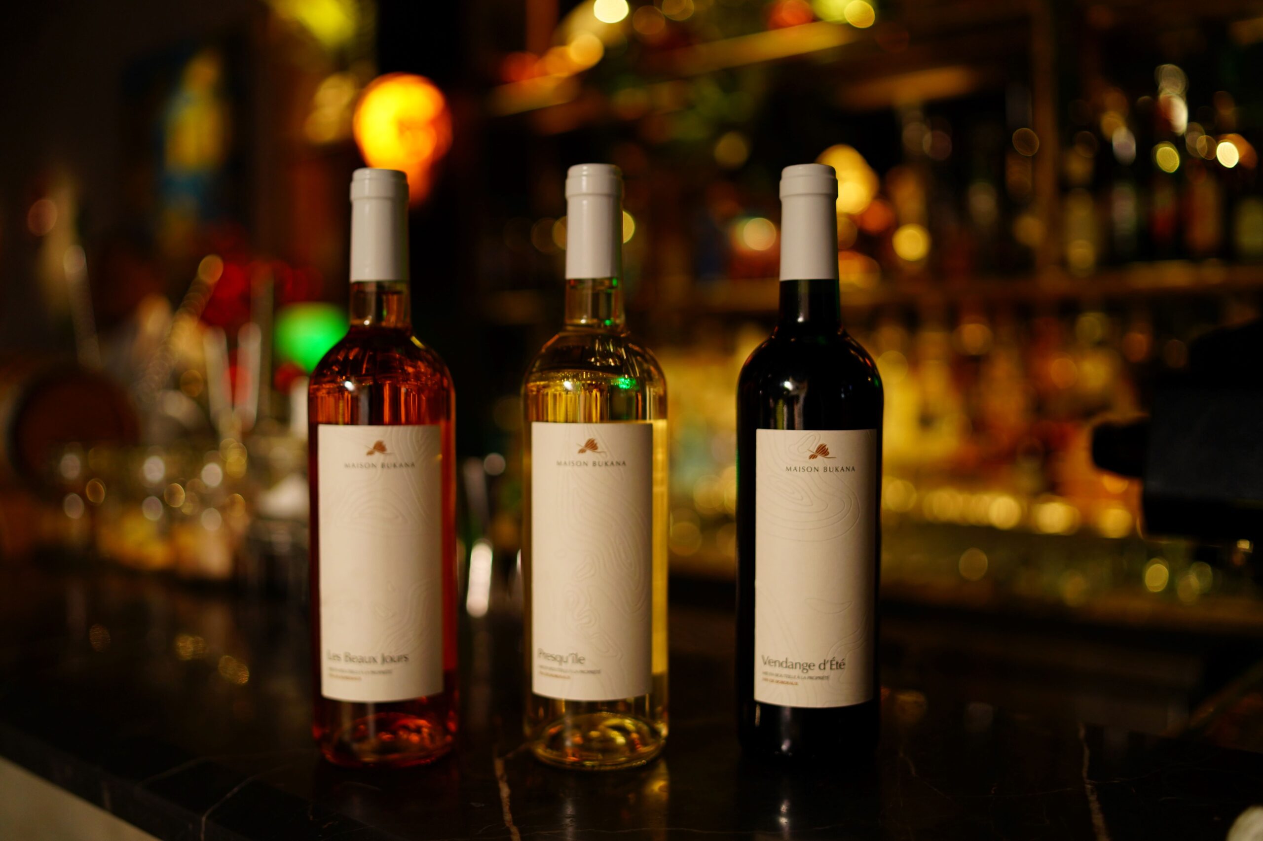 Bottles of rosé, white, and red wines 