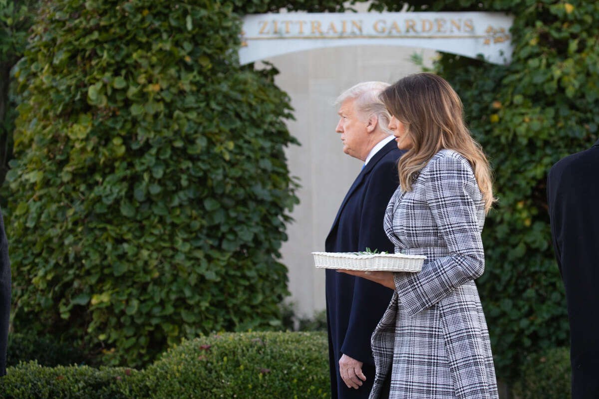 President Donald J. Trump and First Lady Melania Trump visit a memorial Tuesday, Oct. 30, 2018, outside the Tree of Life Congregation Synagogue in Pittsburgh, placing flower and stones in remembrance of the victims of Saturday’s mass shooting.