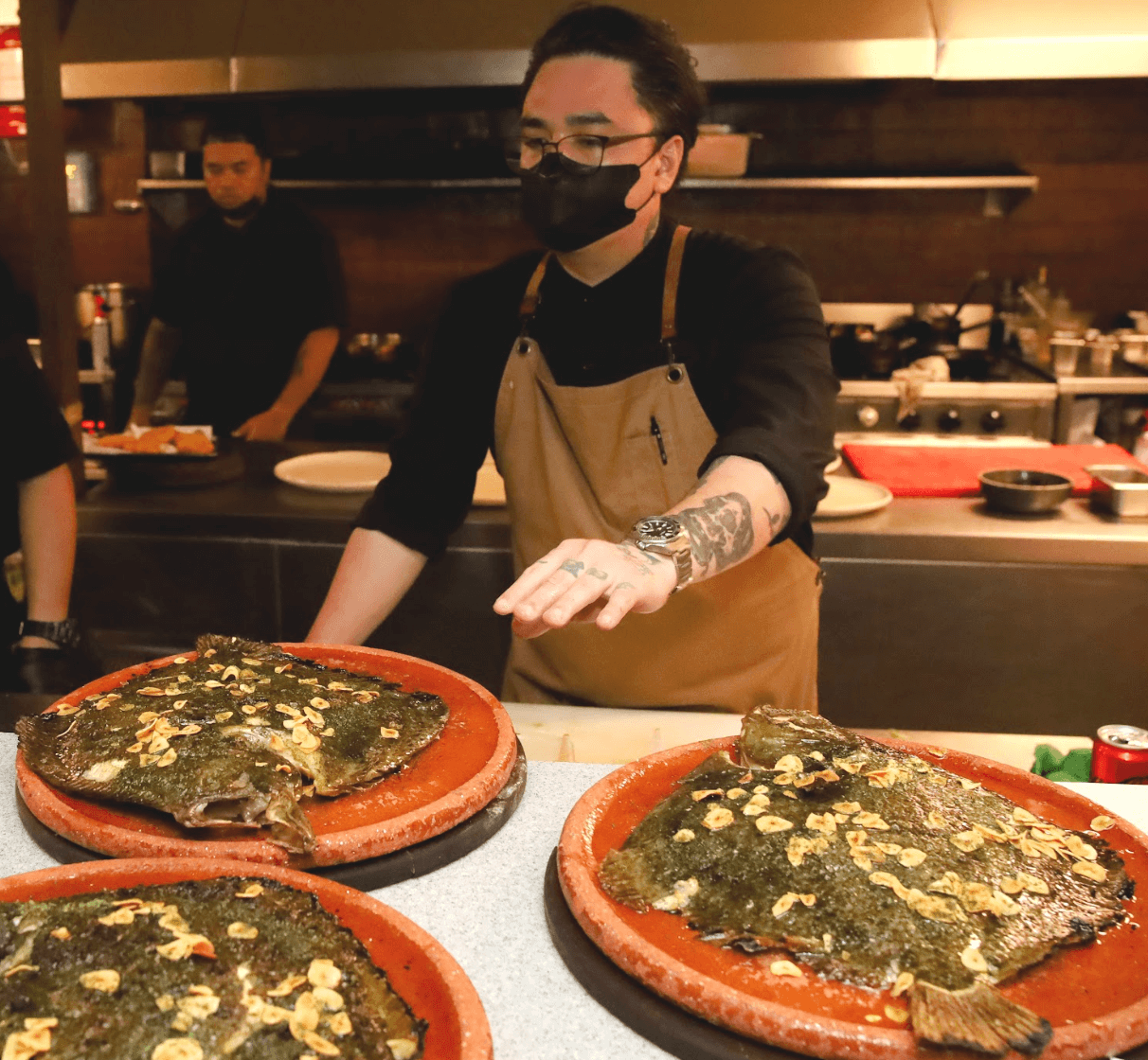 Txoko Chef Albert Mendoza prepares Rodaballo.