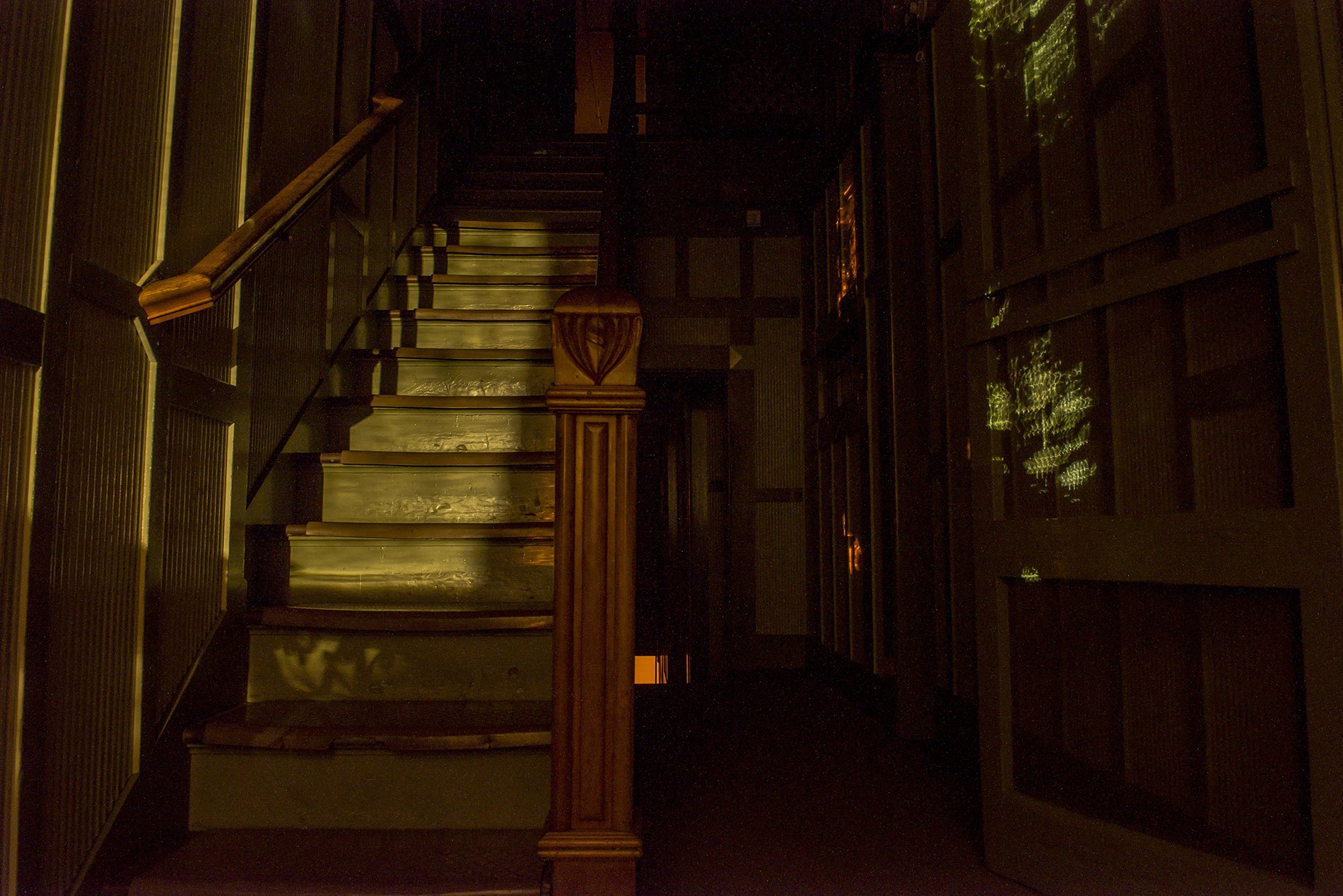 A staircase in the home at night
