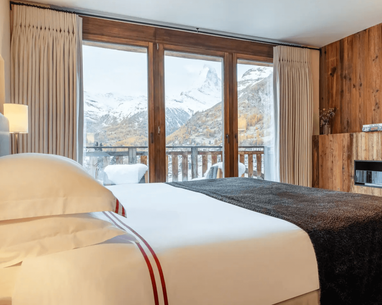 One of the bedrooms in the chalet with a view of the Matterhorn