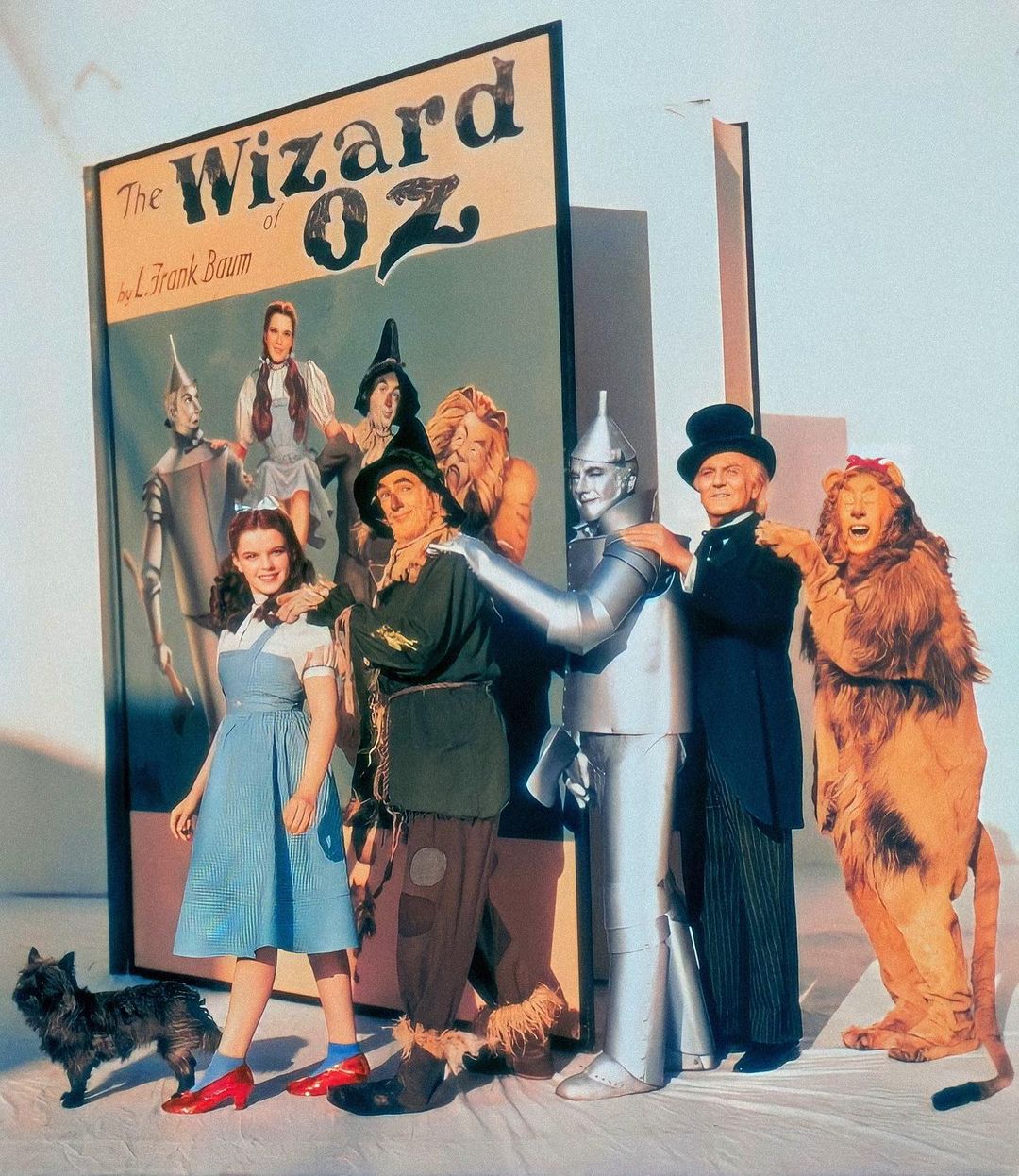 The cast of The Wizard of Oz, where Garland plays Dorothy