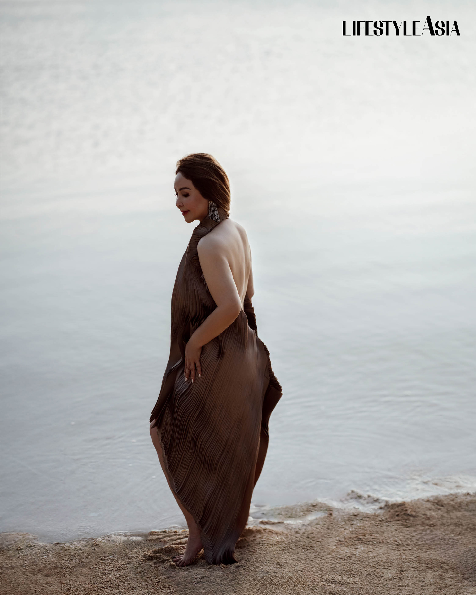 Silver gray bookleaf halter dress, IVARLUSKI ASERON; Silver fringe earrings, ARNEL PAPA.