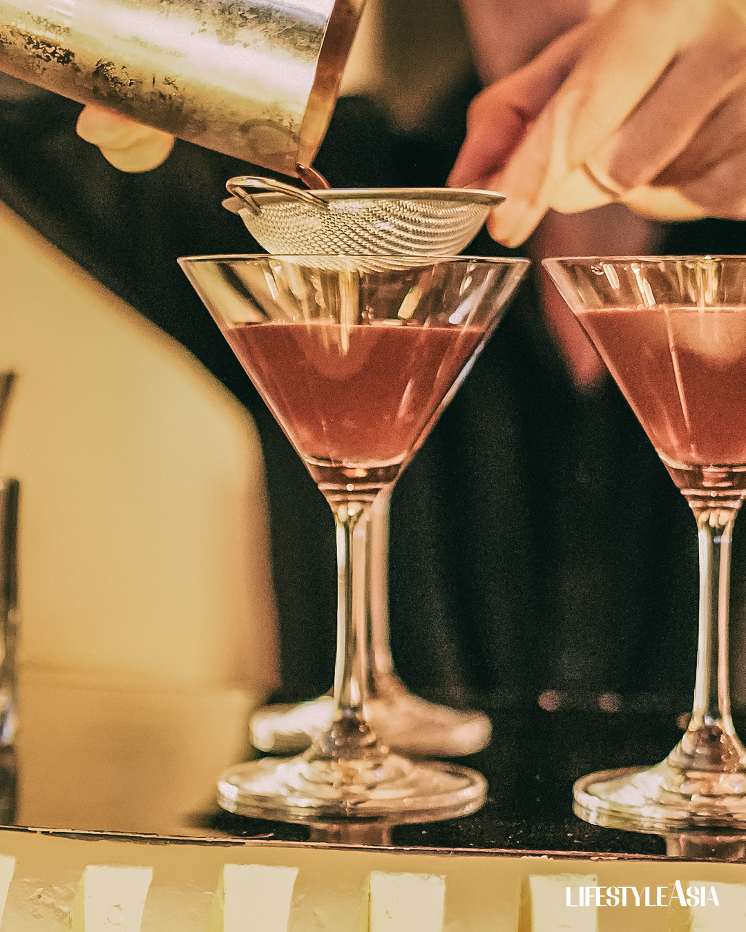 The Espresso Martini from Sula Spirits being poured into a martini glass