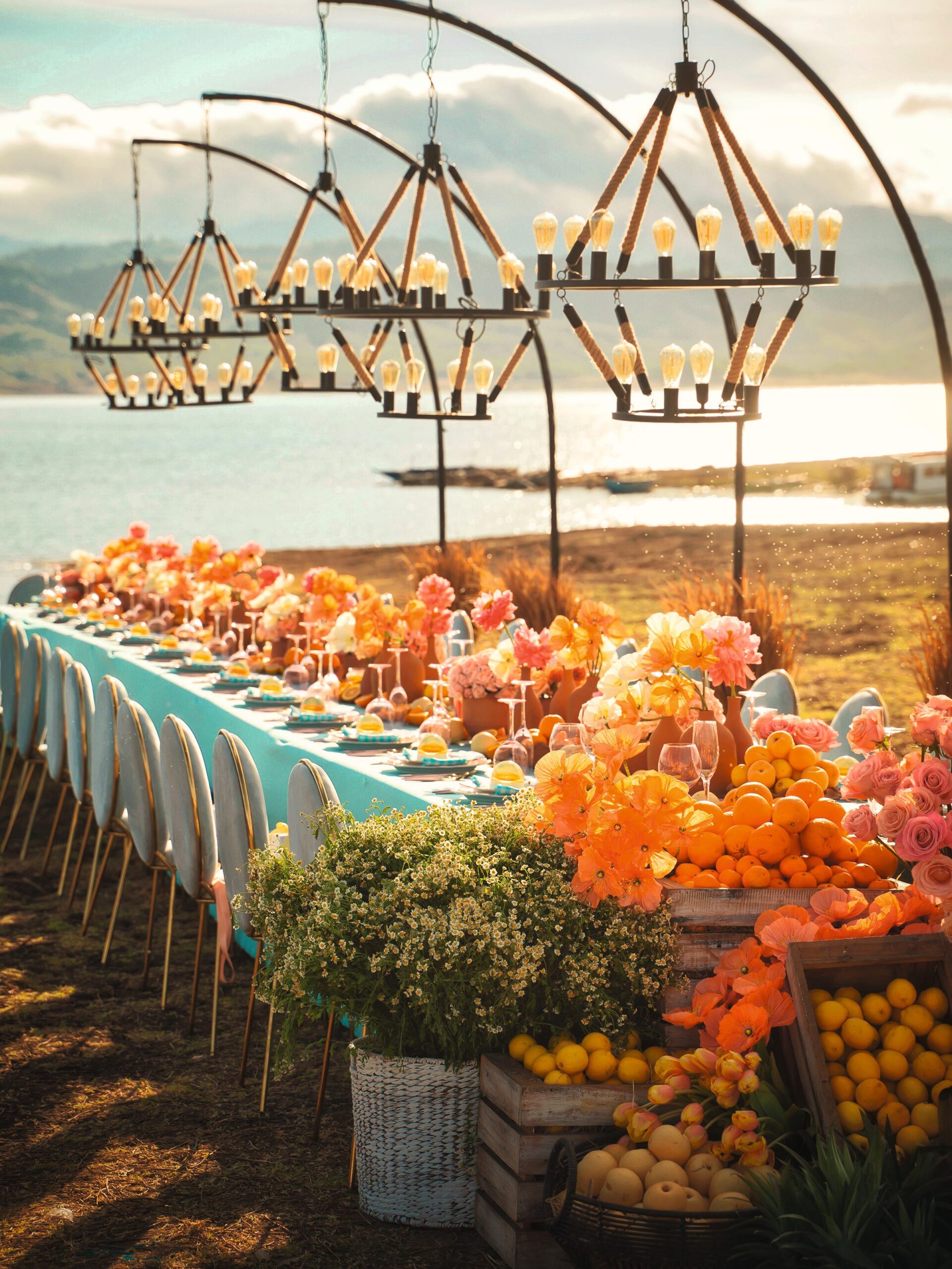 An outdoor wedding reception by the lake