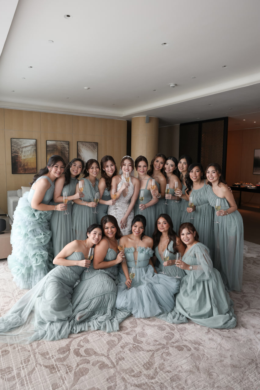 Mikaela and her bride tribe enjoyed their champagne. Michael Cinco created her wedding gown, while the women's entourage dresses are from Patrice Uytengsu