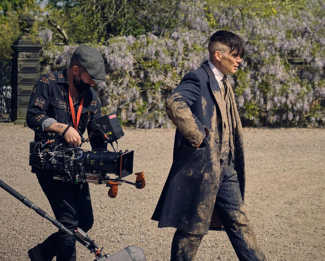 Cillian Murphy (right) behind the scenes during Peaky Blinders season six, along with director Anthony Byrne (left)