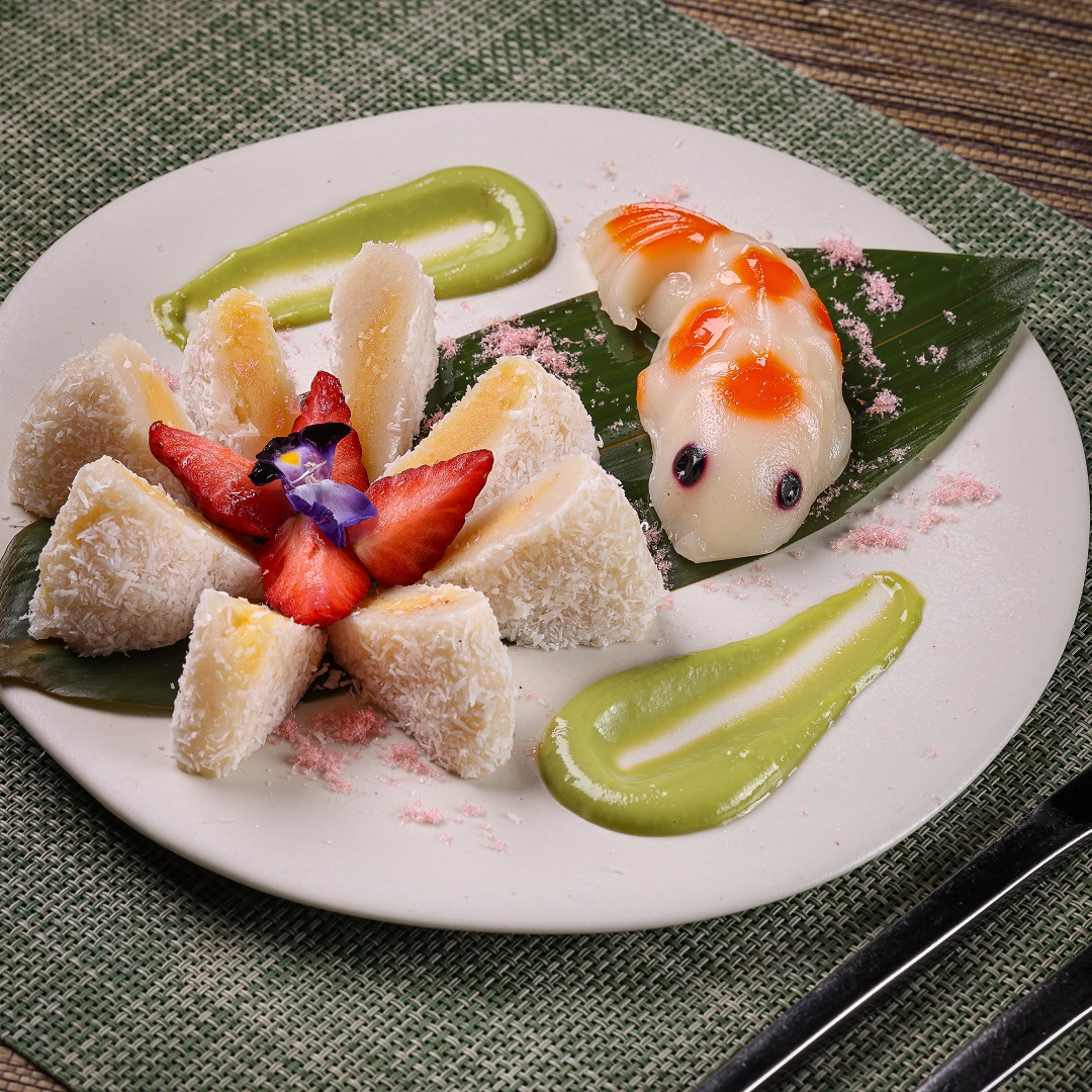 Red Ginger's Nian Gao features custard-filled rice cakes and fish-shaped tikoy