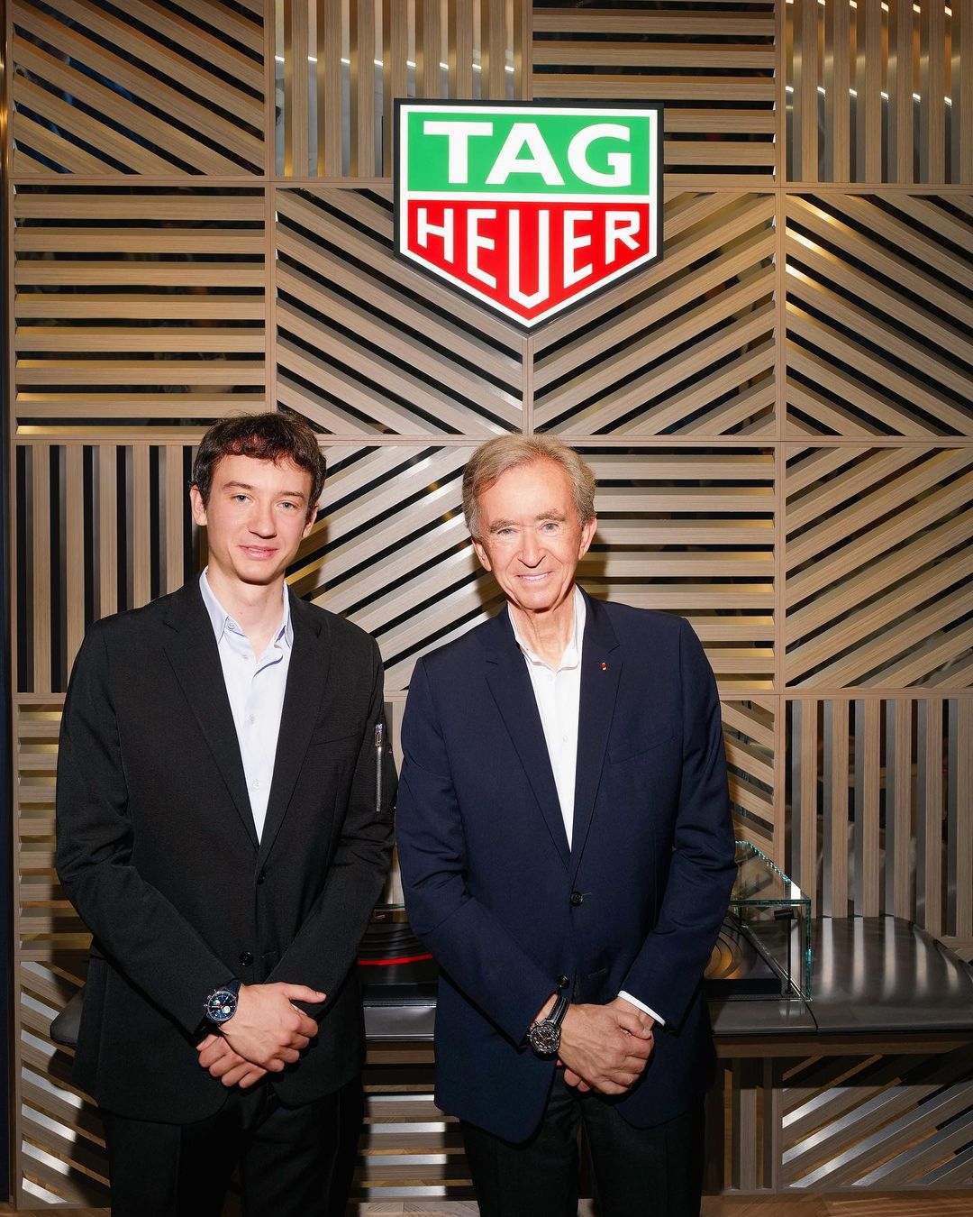 Frédéric Arnault beside his father, LVMH Chairman and CEO Bernard Arnault