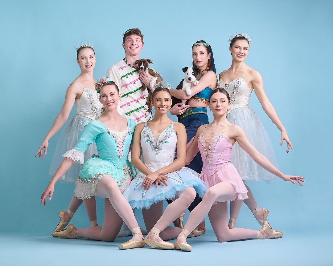 Dancers of Saint Louis Ballet pose with animals from Stray Rescue Saint Louis