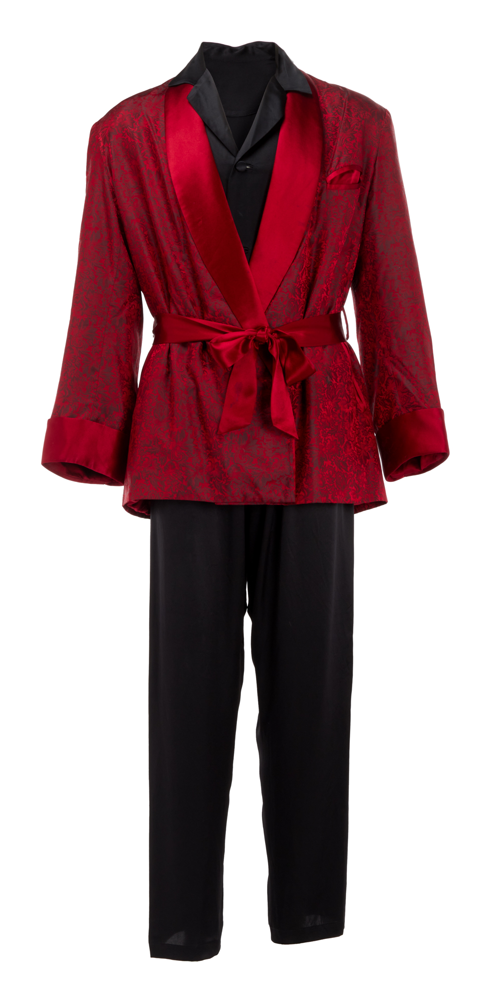 The set of Hugh Hefner’s classic smoking jacket, silk pajamas, slippers, and tobacco pipe will be going under the hammer