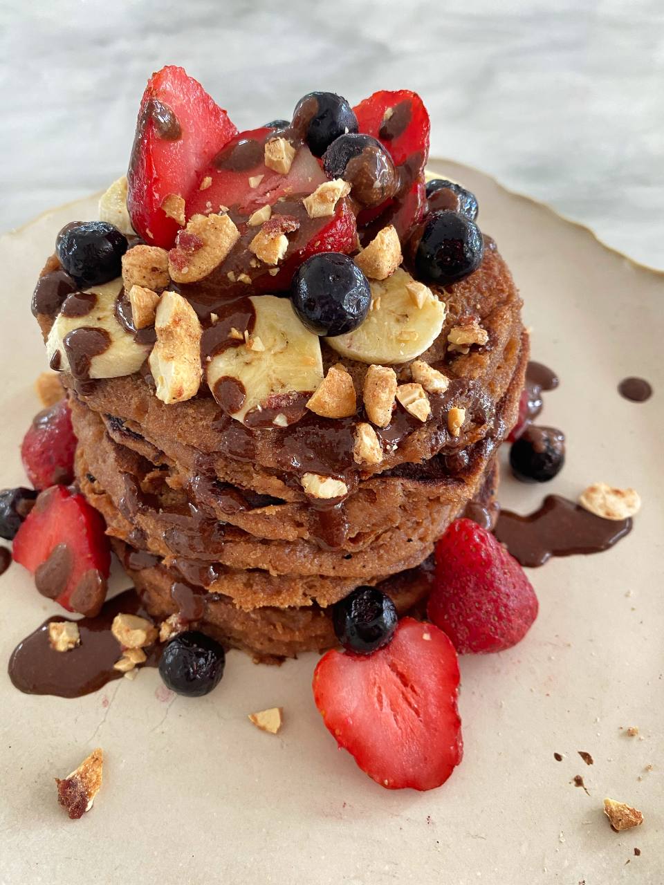 Gluten-free pancakes with almond and coconut flour with chocolate tahini sauce by Samantha Morales