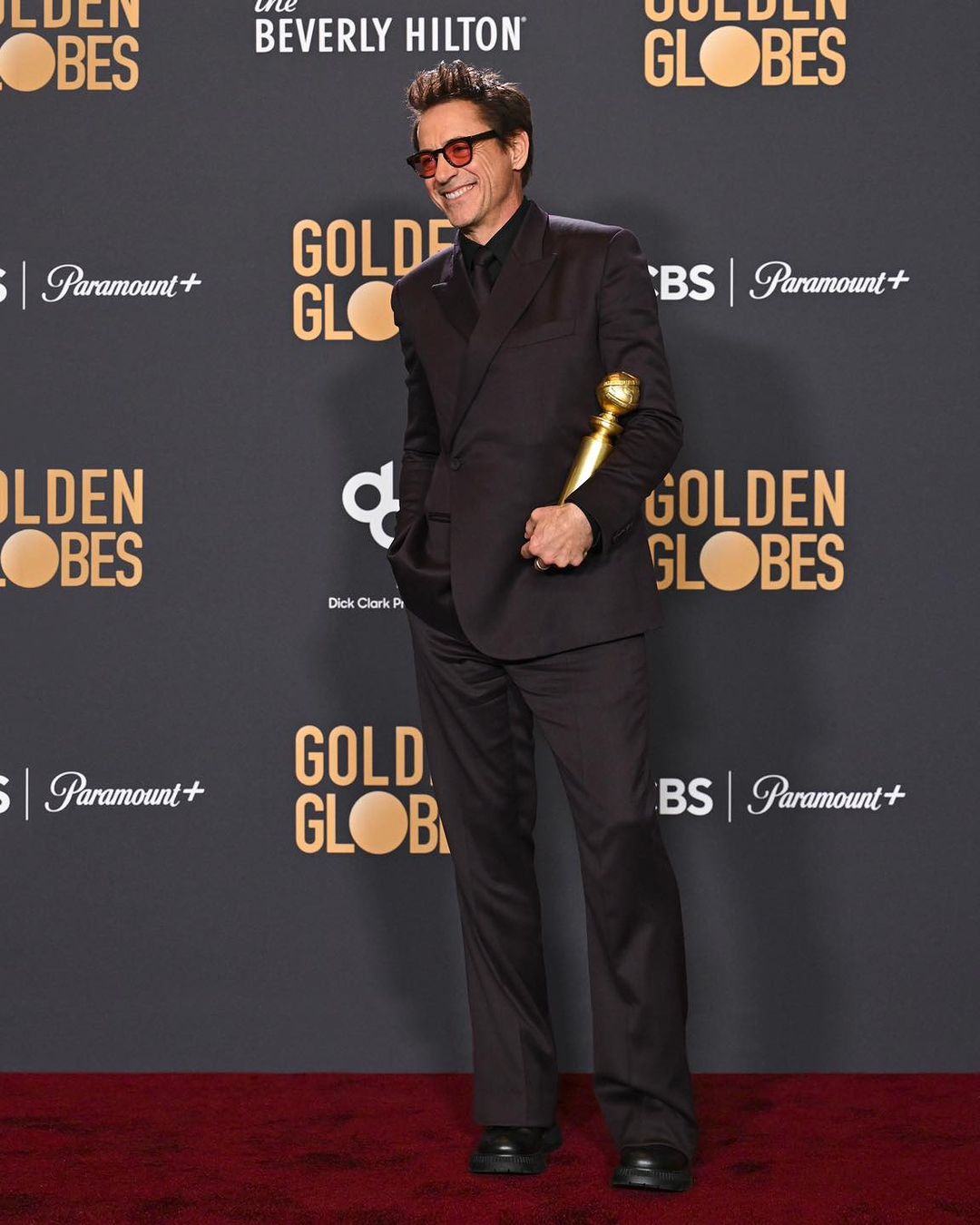 Robert Downey Jr. in a burgundy suit by Dior