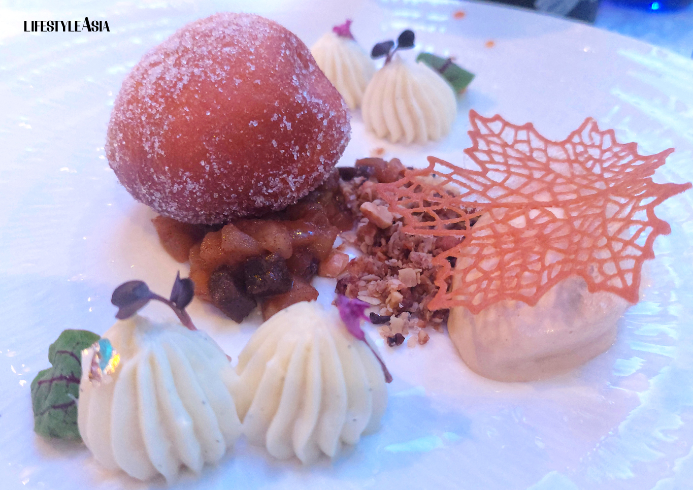 A "Saga Beignet" with Wagyu Apple Compote and Miso Caramel Ice Cream
