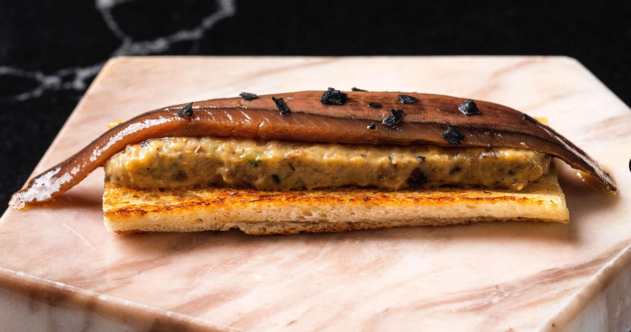 Tosta de Anchoa y Berenjena (Cantabrian premium anchovy, baguette toast and charred eggplant)