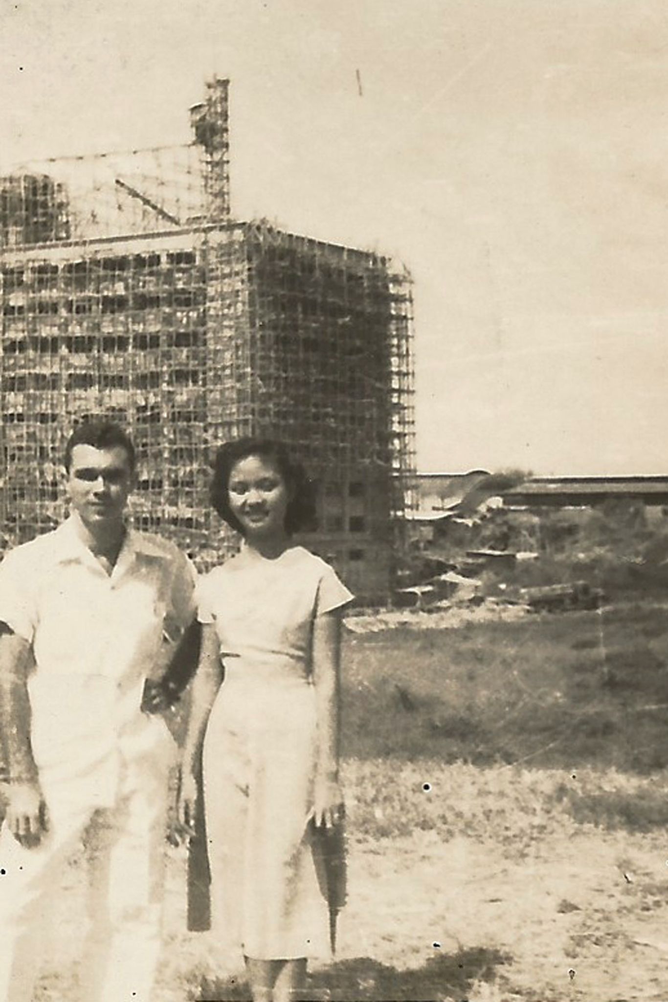 Sanso (left) in front of the construction site of the UP Main Library