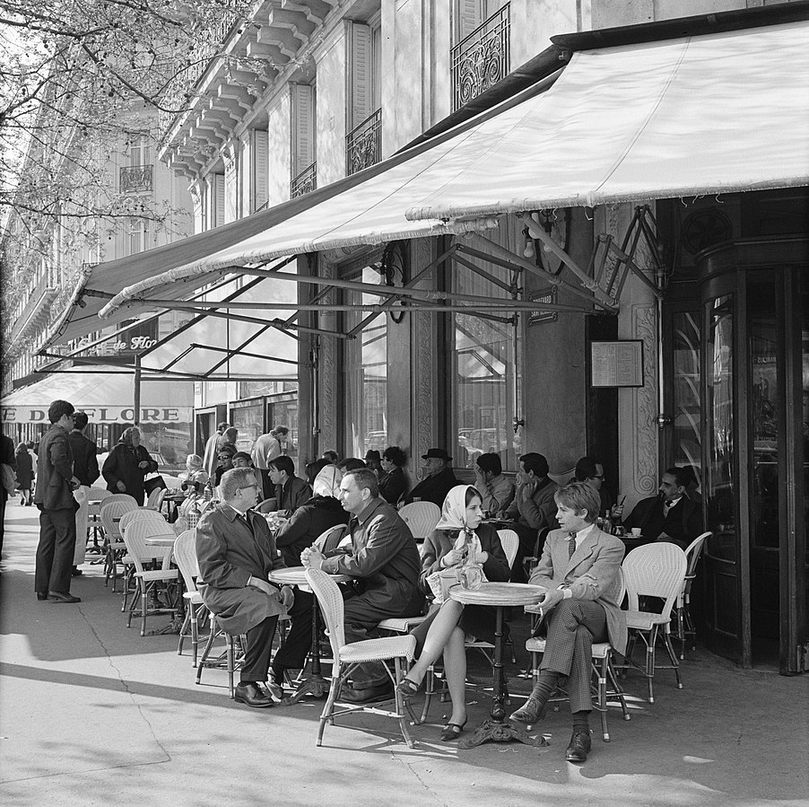 Les Deux Magots in 1965 (left) and 2023 (right)