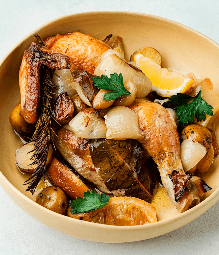 TOP LEFT: Squid Ink Paella with Seafood; TOP RIGHT: Seafood Platter (Maine Lobster, Pulpo, Prawn and Hamachi Collar); BOTTOM LEFT: Iberian Chicken; BOTTOM RIGHT: Duck Confit Adobo a la Orange