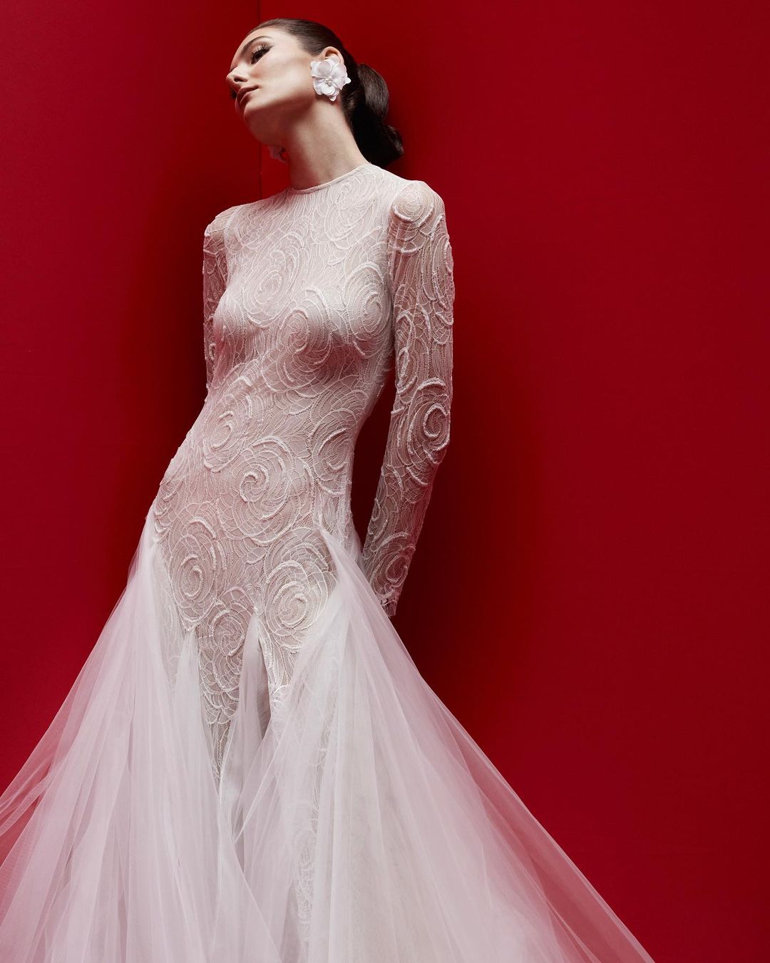 A gown with a rose motif made with French lace and tulle