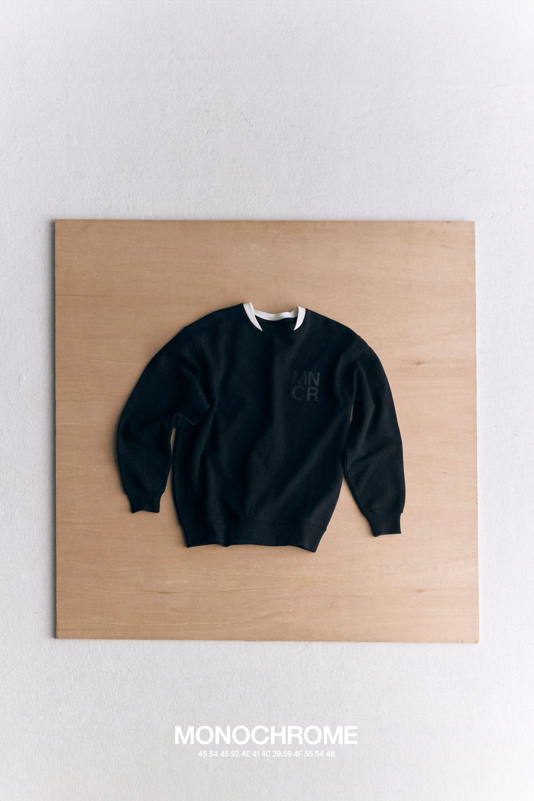 Sweater from BTS' Monochrome pop-up store