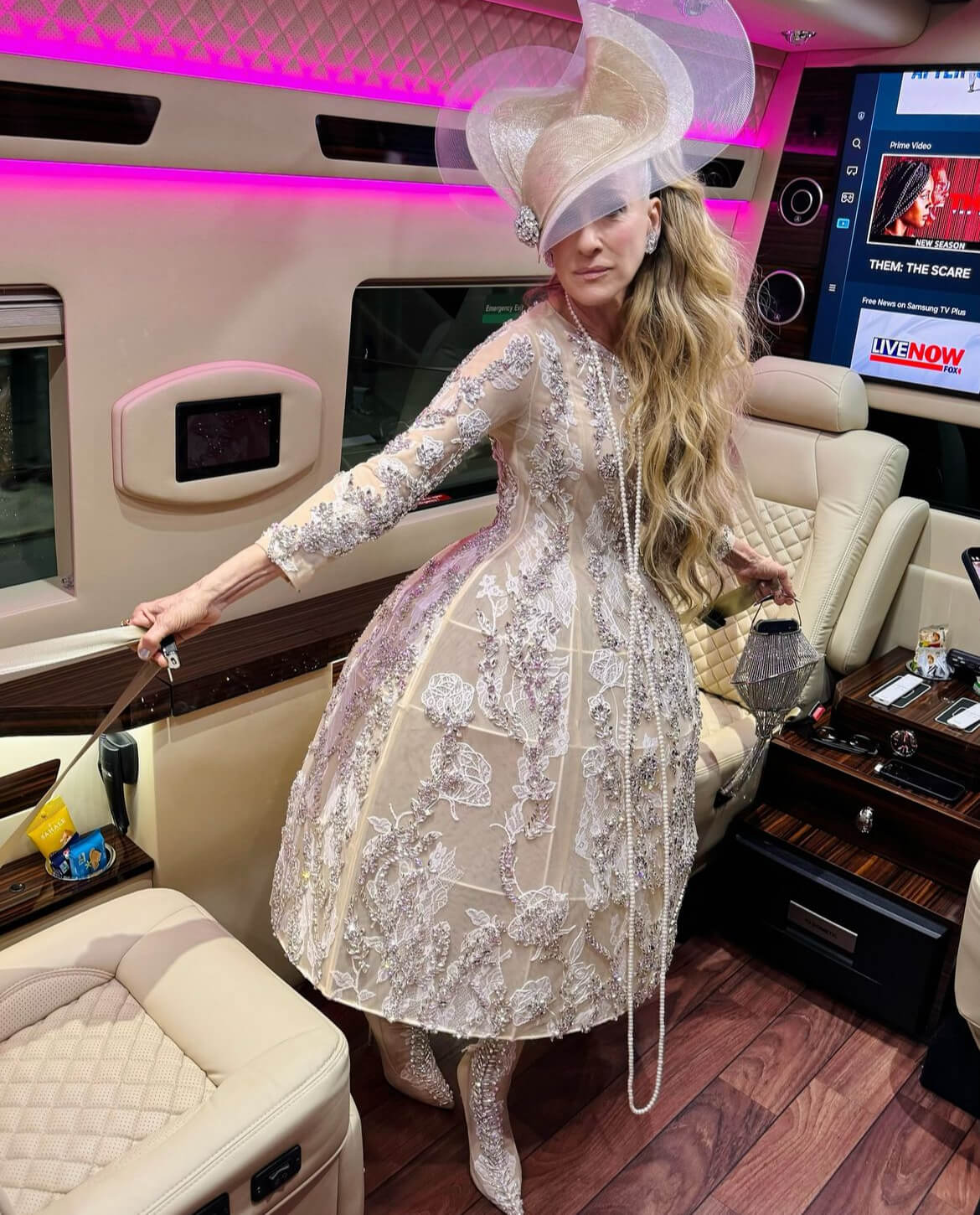 For the 2024 Met Gala, Sarah Jessica Parker arrived in a custom couture gown and headpiece by British designer Richard Quinn, as reported by Harper’s Bazaar. 